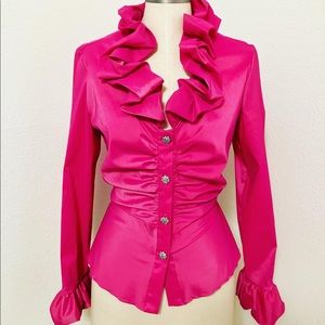 Ruffle Blouse around the color and sleeves.